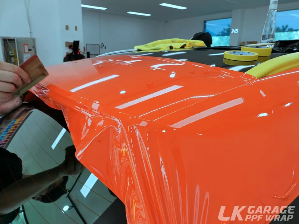 Genesis GV80 vinyl wrap - Genesis GV80 Vinyl Wrap Review: Bold Orange Color Change photo 4