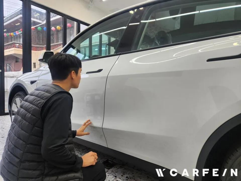 Tesla Tesla window tinting installation result