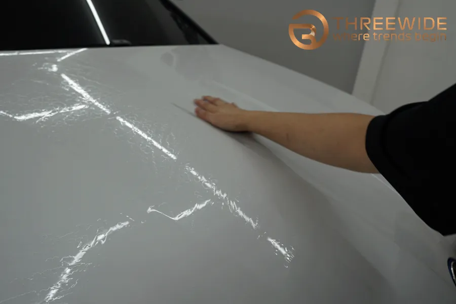 BMW iX vinyl wrap - BMW iX Vinyl Wrap Review: High-Gloss Red Color Change photo 4