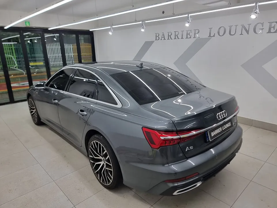 Audi A6 vinyl wrap - Audi A6 Vinyl Wrap Review: Matte Black Transformation & Cost photo 4