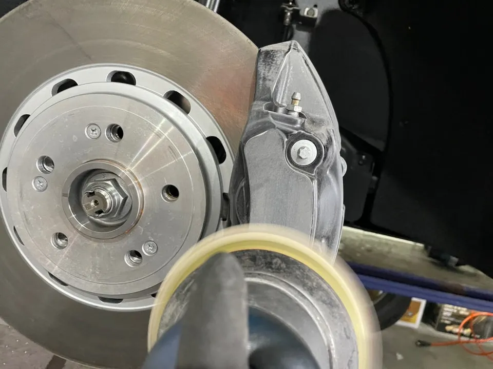 Genesis GV70 caliper painting - Genesis GV70 Caliper Paint Review — Black to Red Transformation photo 6