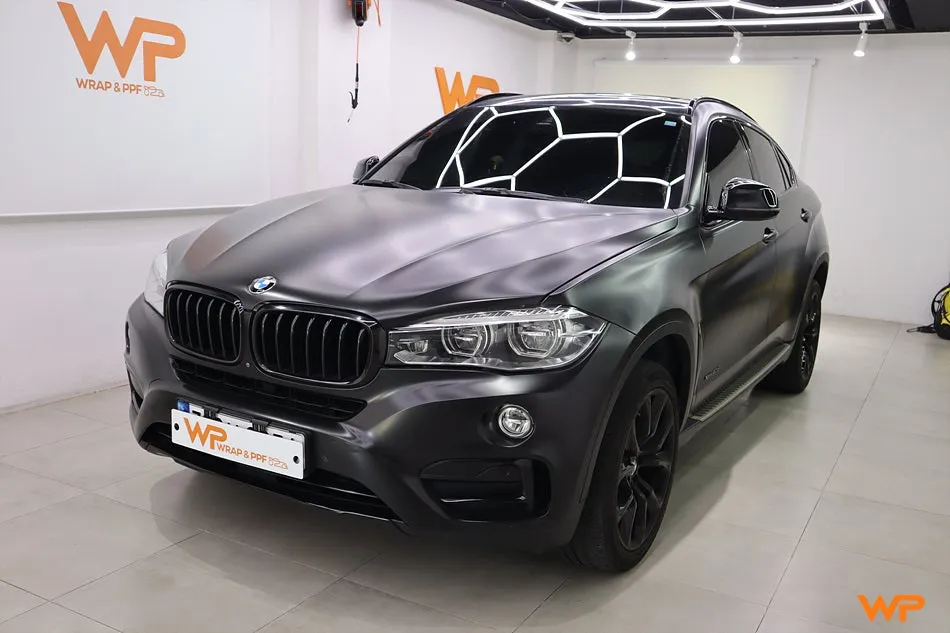 BMW X6 F16のカーラッピング事例|エメラルドグリーンへの変身 施工写真 1-2