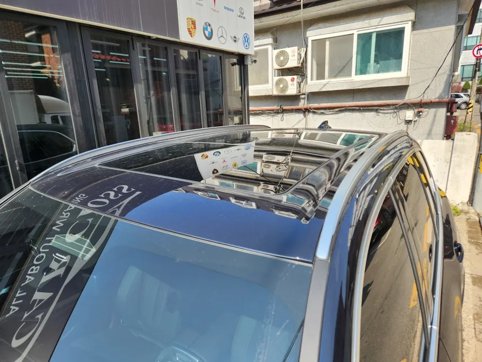 BMW X5 vinyl wrap - BMW X5 Chrome Delete Wrap Review — Cost & Results photo 5