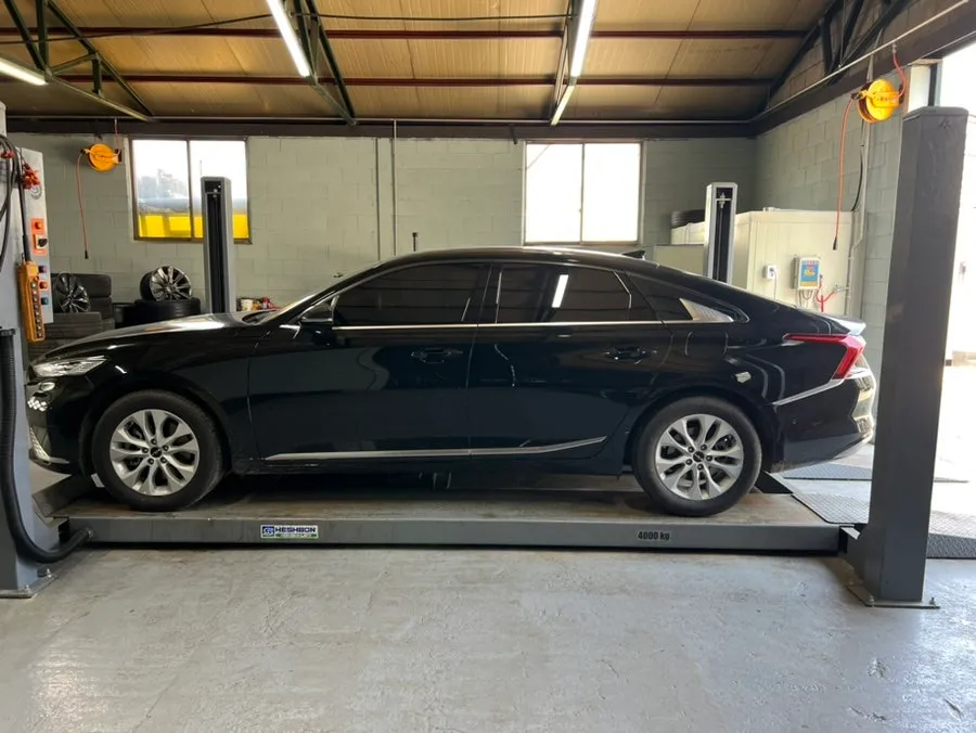 Kia K8 wheel repair - Kia K8 Wheel Painting Review: Black Gloss Transformation photo 3