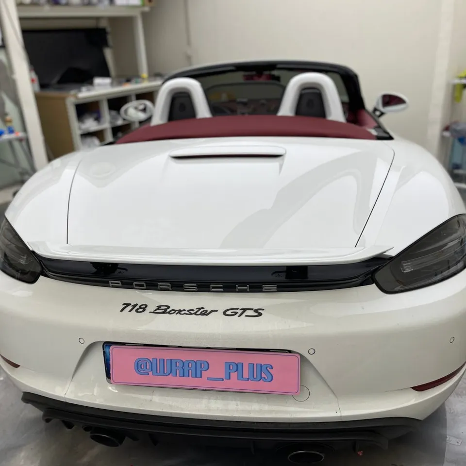 Porsche Boxster vinyl wrap - Porsche Boxster Vinyl Wrap Review: Sakura Pink Cost & Results photo 3