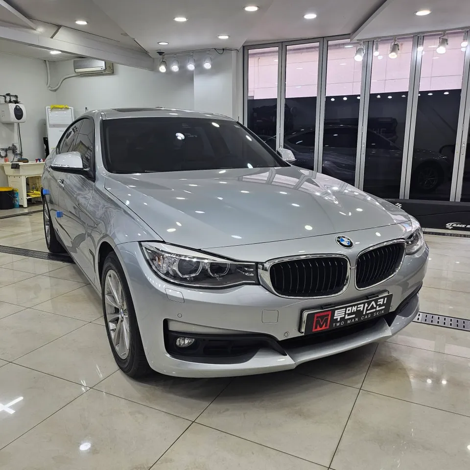 BMW 3 Series vinyl wrap - BMW 3 Series Vinyl Wrap Review: Black Color Change Cost & Results photo 4