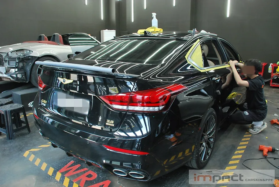 Genesis G80 DH vinyl wrap - Genesis G80 DH Vinyl Wrap Review: Chrome Delete Cost & Results photo 3