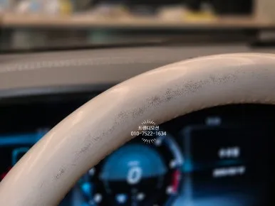 Mercedes-Benz CLS interior customization - Mercedes-Benz CLS Steering Wheel Restoration & Seatbelt Color Cha photo 4