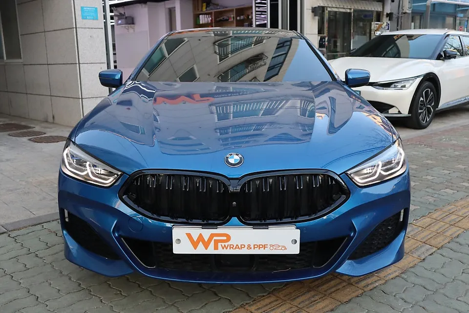 BMW 8 Series vinyl wrap - BMW 8 Series Vinyl Wrap Review: Chrome Delete for Black Performan photo 2