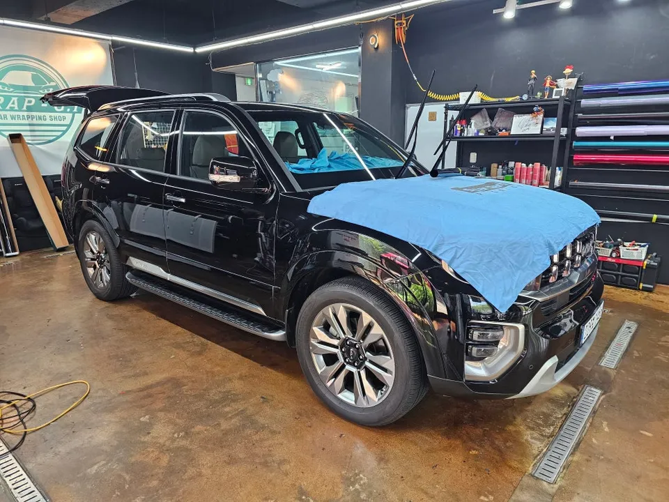 Kia Mohaveのカーフィルム施工事例｜費用目安・仕上がり 施工写真 1-2