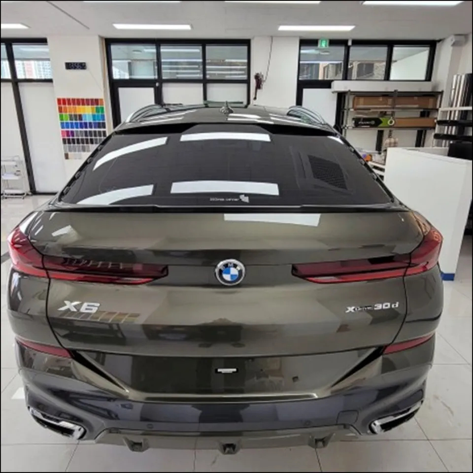 BMW X6 vinyl wrap - BMW X6 Vinyl Wrap Review — Glossy White Color Change photo 3