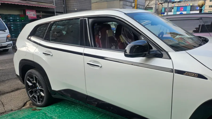 BMW XM vinyl wrap - BMW XM Vinyl Wrap Review: Carmine Red Color Change Cost photo 3