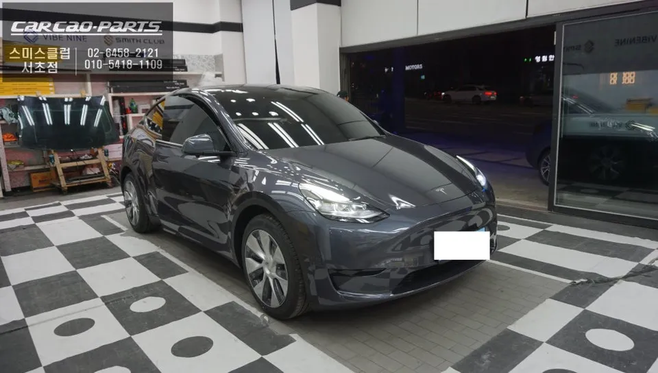 Tesla Model Y around view - Tesla Model Y Around View Monitor Review: Seamless Parking photo 6