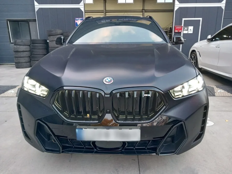 BMW X6 40i Wheel Refinishing Review — Glossy Black Restoration photo 2