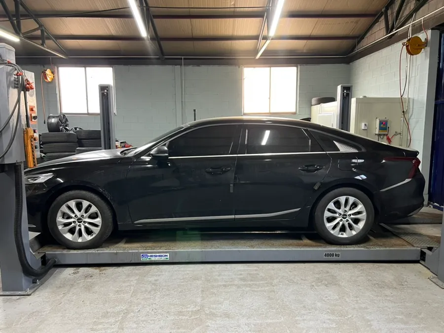Kia K8 wheel repair - Kia K8 Wheel Repair & Painting Review: Gloss Black Finish photo 2
