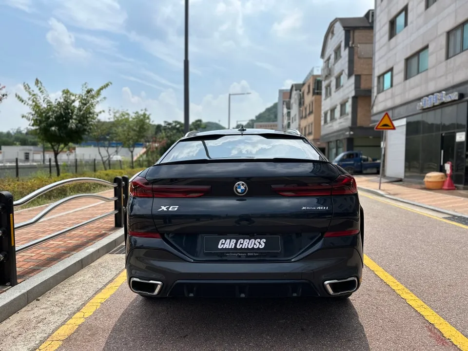 BMW X6 vinyl wrap - BMW X6 Vinyl Wrap Review: Chrome Delete & Carbon Black photo 3
