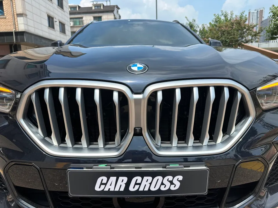 BMW X6 vinyl wrap - BMW X6 Vinyl Wrap Review: Chrome Delete & Carbon Black photo 4