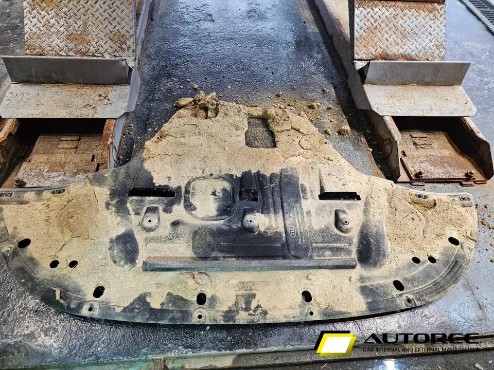 Kia K8 paint correction - Kia K8 Undercarriage Mud Removal Review — Cleaned photo 3