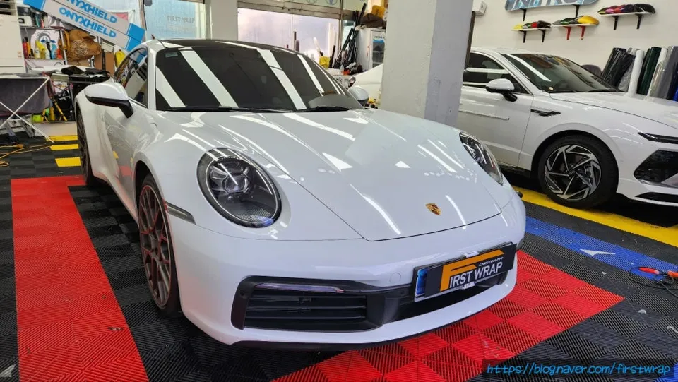 ポルシェ911カレラ カーラッピング事例|タンザナイトブルー 施工写真 1-2