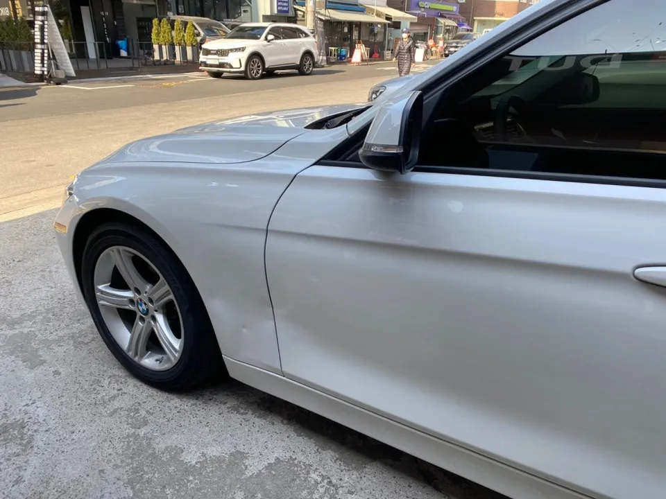 BMW 320d body repair - BMW 320d Auto Body Repair Review: Side Panel Restoration photo 3