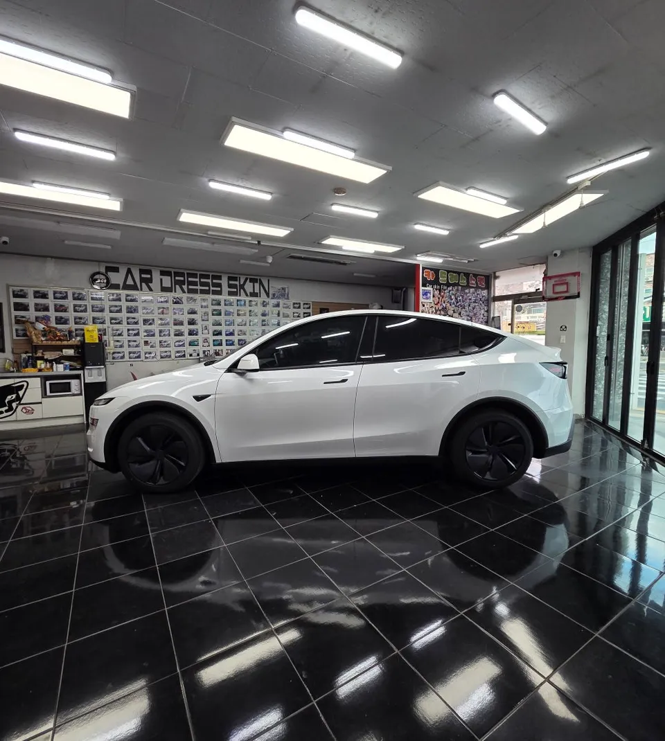 Tesla Model Y Vinyl Wrap Review: Pure Silver Color Change photo 1