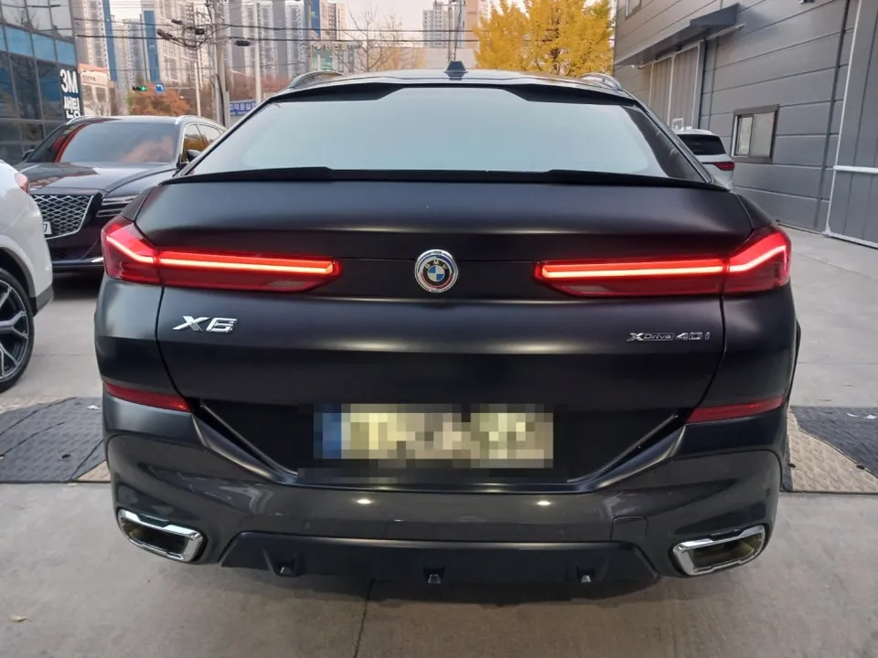 BMW X6 wheel repair - BMW X6 Wheel Repair & Refinishing Review — Deep Gloss Black photo 3