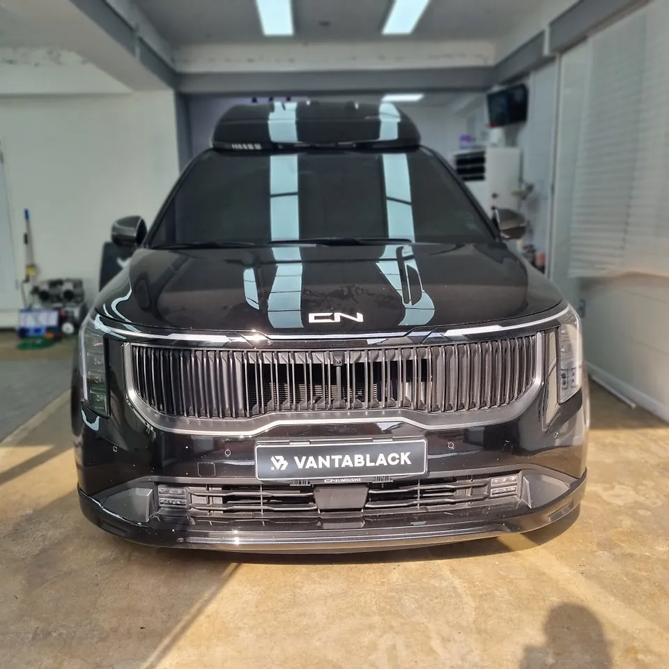 Kia Carnivalのカーラッピング事例|メタリックオレンジのツートン施工 施工写真 1-1