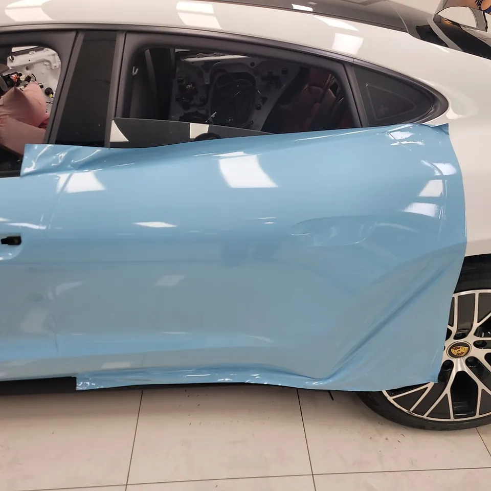Porsche Taycan vinyl wrap - Porsche Taycan Vinyl Wrap Review: Frozen Blue Metallic Transforma photo 6