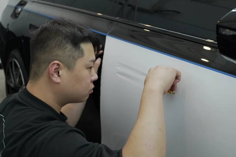 BMW 7 Series vinyl wrap - BMW 7 Series Color Change Wrap Review: Orca Edition photo 4