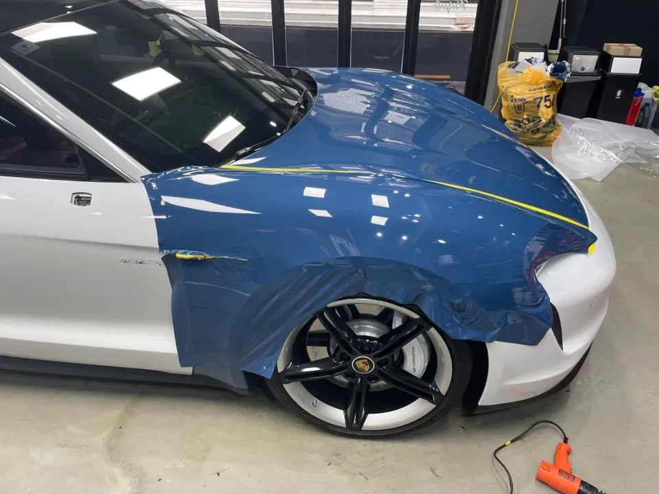 Porsche Taycan vinyl wrap - Porsche Taycan Vinyl Wrap Review — Neptune Blue Color Change photo 3
