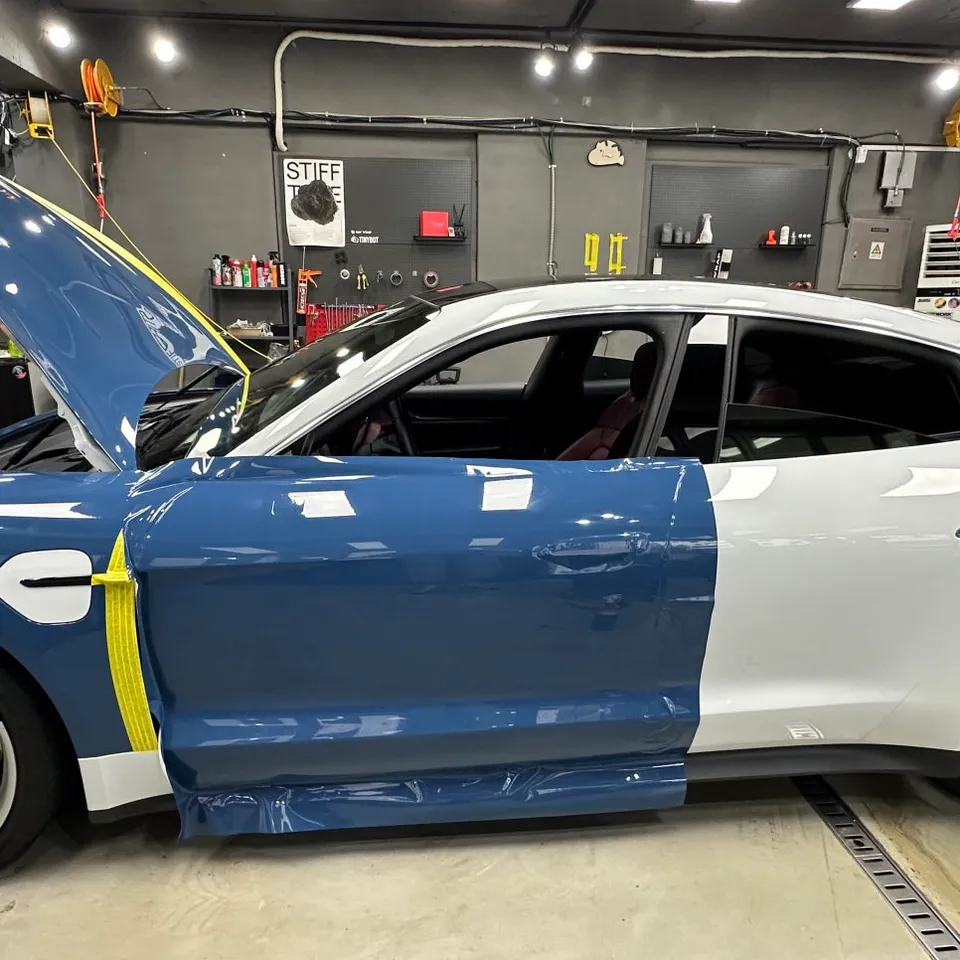 Porsche Taycan vinyl wrap - Porsche Taycan Vinyl Wrap Review — Neptune Blue Color Change photo 4