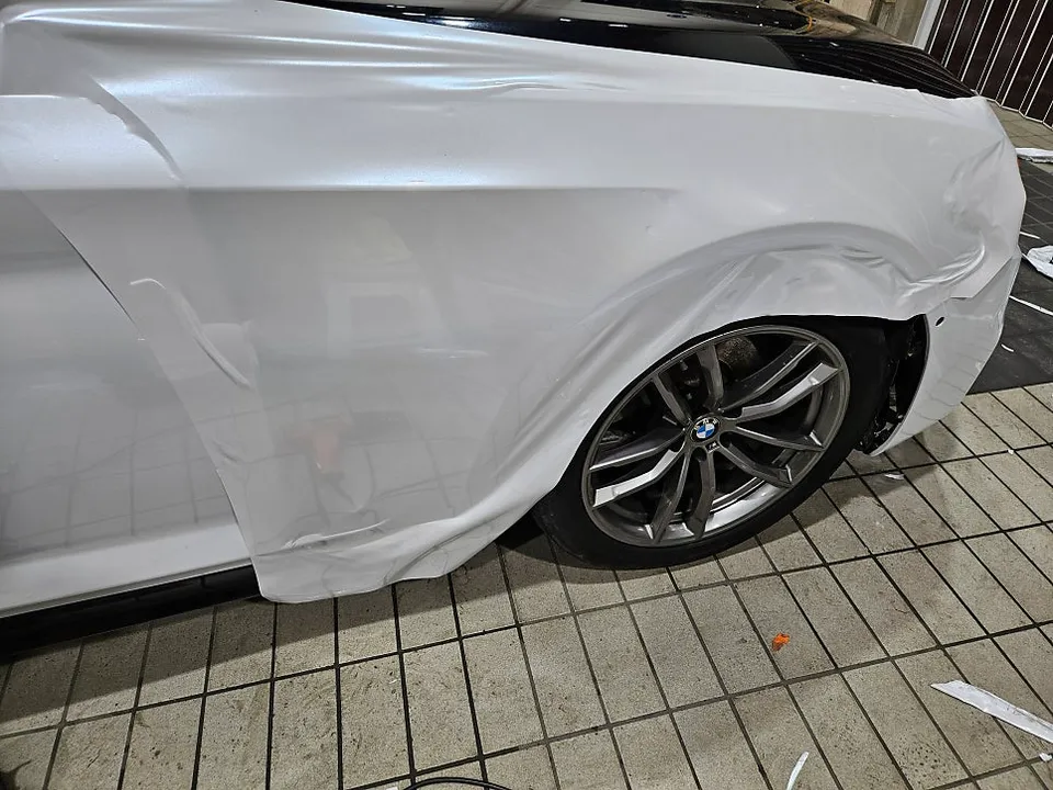 BMW 5 Series Vinyl Wrap Installation Review — Cost photo 2