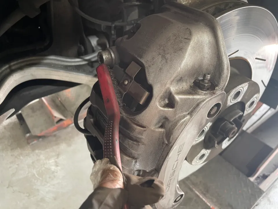 Porsche Panamera caliper painting - Porsche Panamera Caliper Paint Review - Stunning Red Finish photo 7