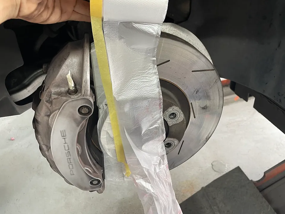 Porsche Panamera caliper painting - Porsche Panamera Caliper Paint Review - Stunning Red Finish photo 8
