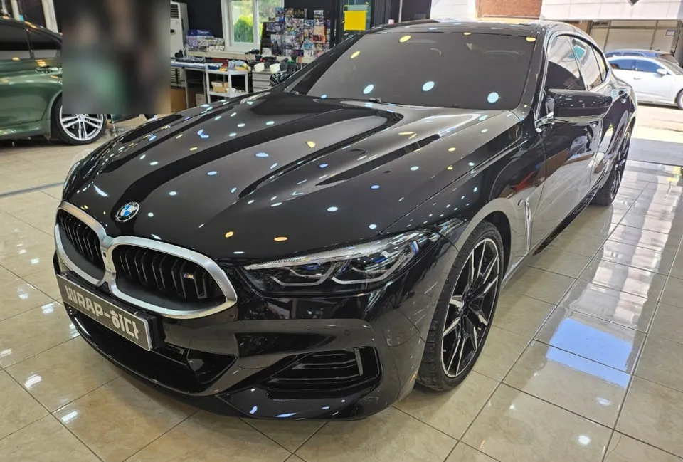 BMW 8 Series vinyl wrap - BMW 8 Series Vinyl Wrap Review: Black Chrome Delete photo 4