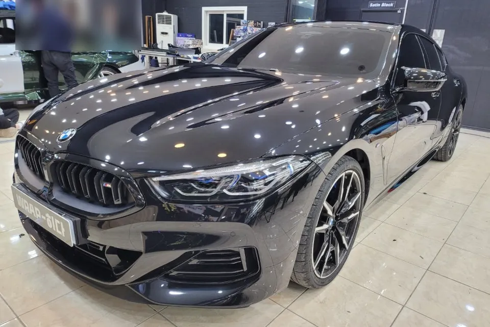 BMW 8 Series vinyl wrap - BMW 8 Series Vinyl Wrap Review: Black Chrome Delete photo 5