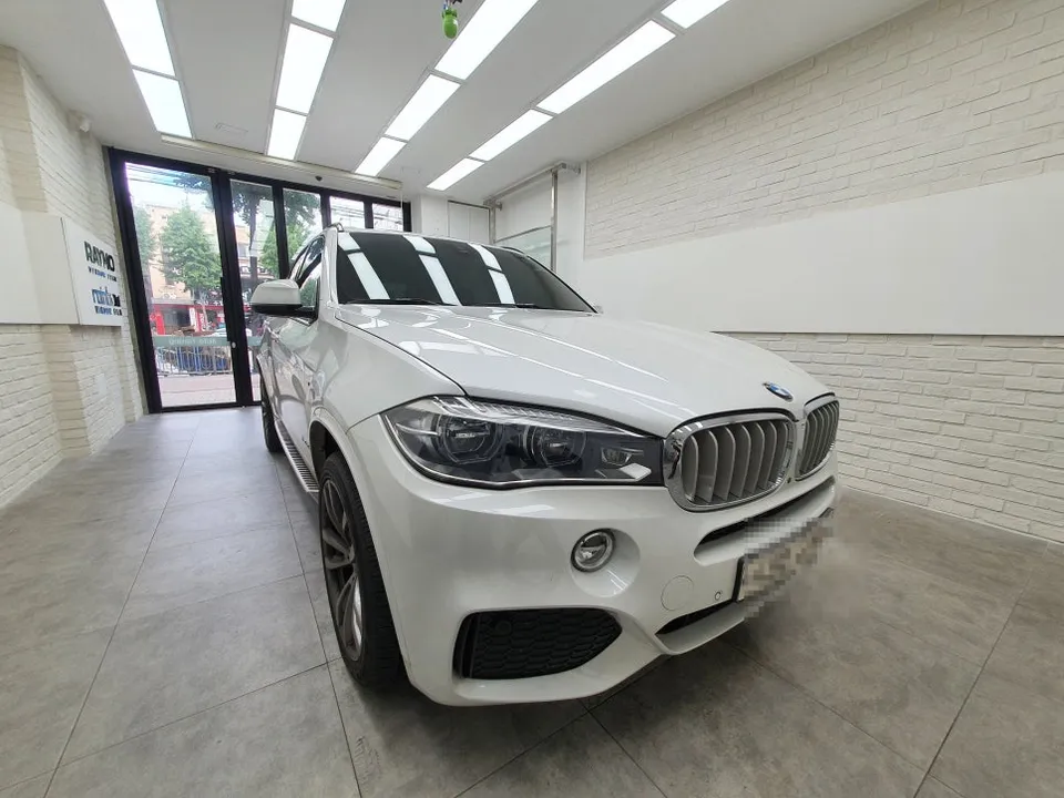 BMW X5 window tinting installation result