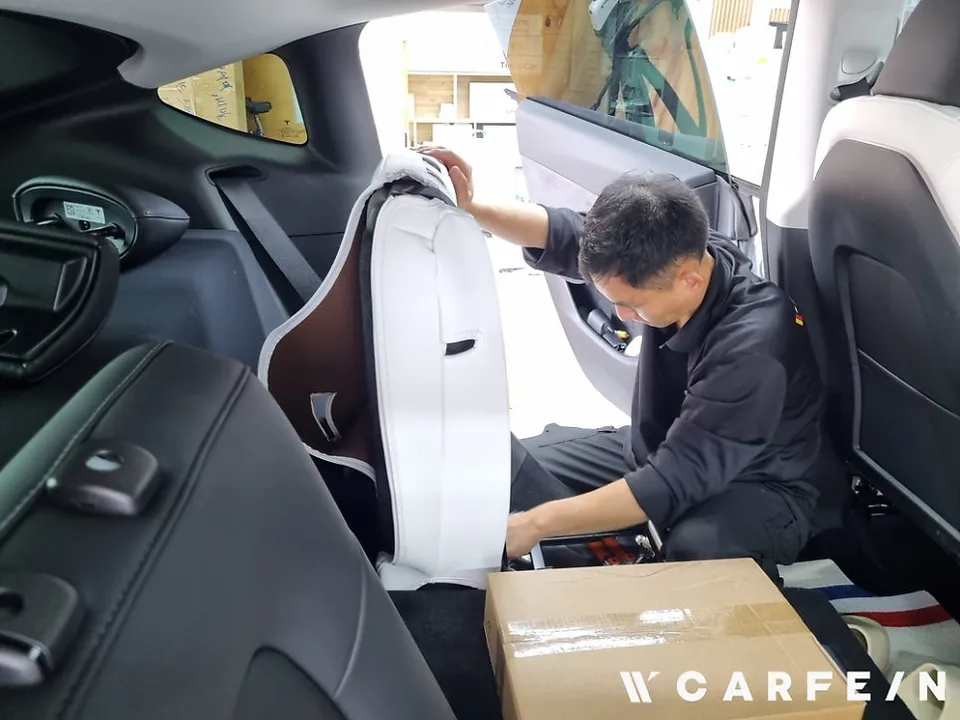 Tesla Model Y interior customization - Tesla Model Y Interior Customization Review — White Seat Upgrade photo 3