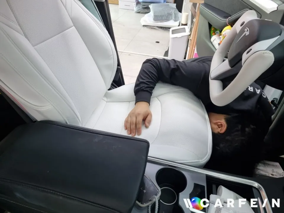 Tesla Model Y interior customization - Tesla Model Y Interior Customization Review — White Seat Upgrade photo 5