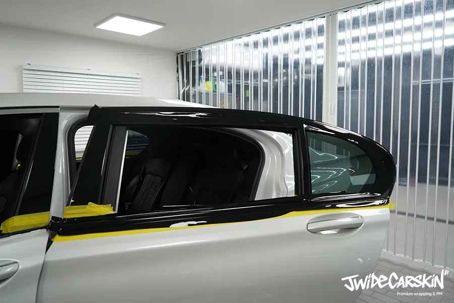 BMW 730LD vinyl wrap - BMW 730LD Vinyl Wrap Review — Sporty Chrome Delete photo 3