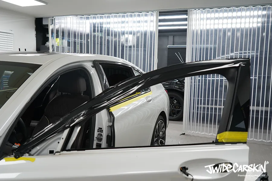 BMW 730LD vinyl wrap - BMW 730LD Vinyl Wrap Review — Sporty Chrome Delete photo 4