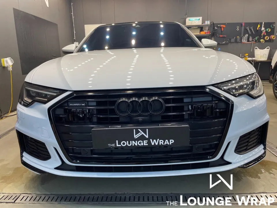 Audi A6 vinyl wrap - Audi A6 Vinyl Wrap Review: Chrome Delete Cost & Results photo 3