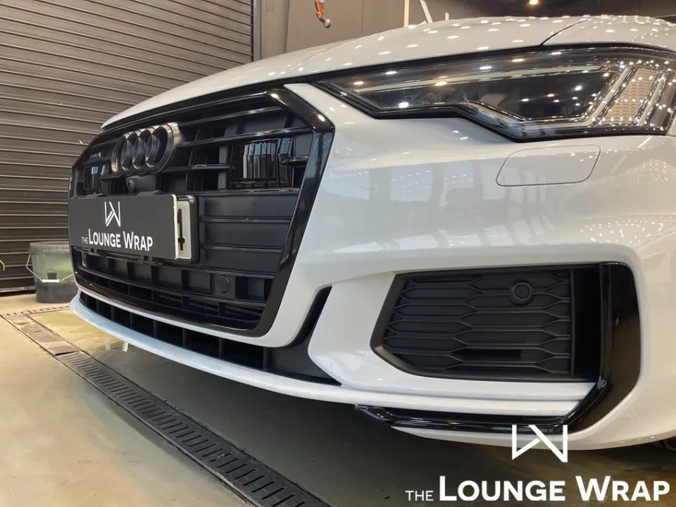Audi A6 vinyl wrap - Audi A6 Vinyl Wrap Review: Chrome Delete Cost & Results photo 5