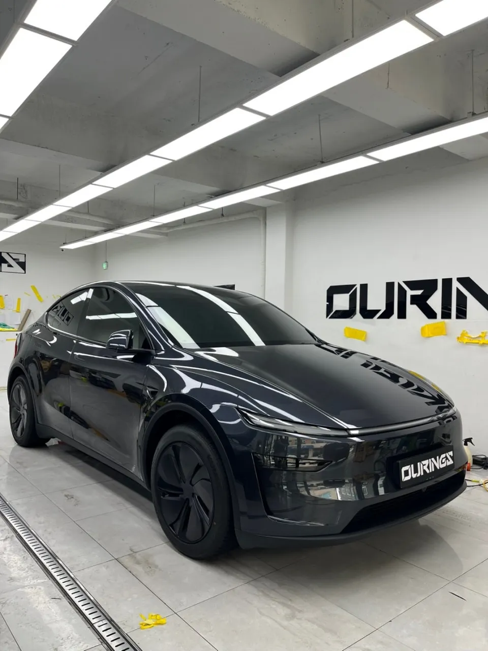 Tesla Model Y vinyl wrap - Tesla Model Y Vinyl Wrap Review: Satin Black Cost & Results photo 4