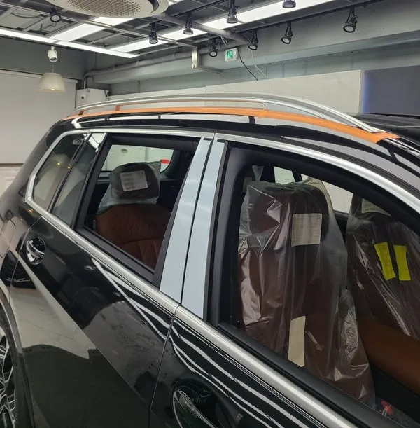 BMW X7 vinyl wrap - BMW X7 Chrome Delete & Black Grill Wrap Review photo 3