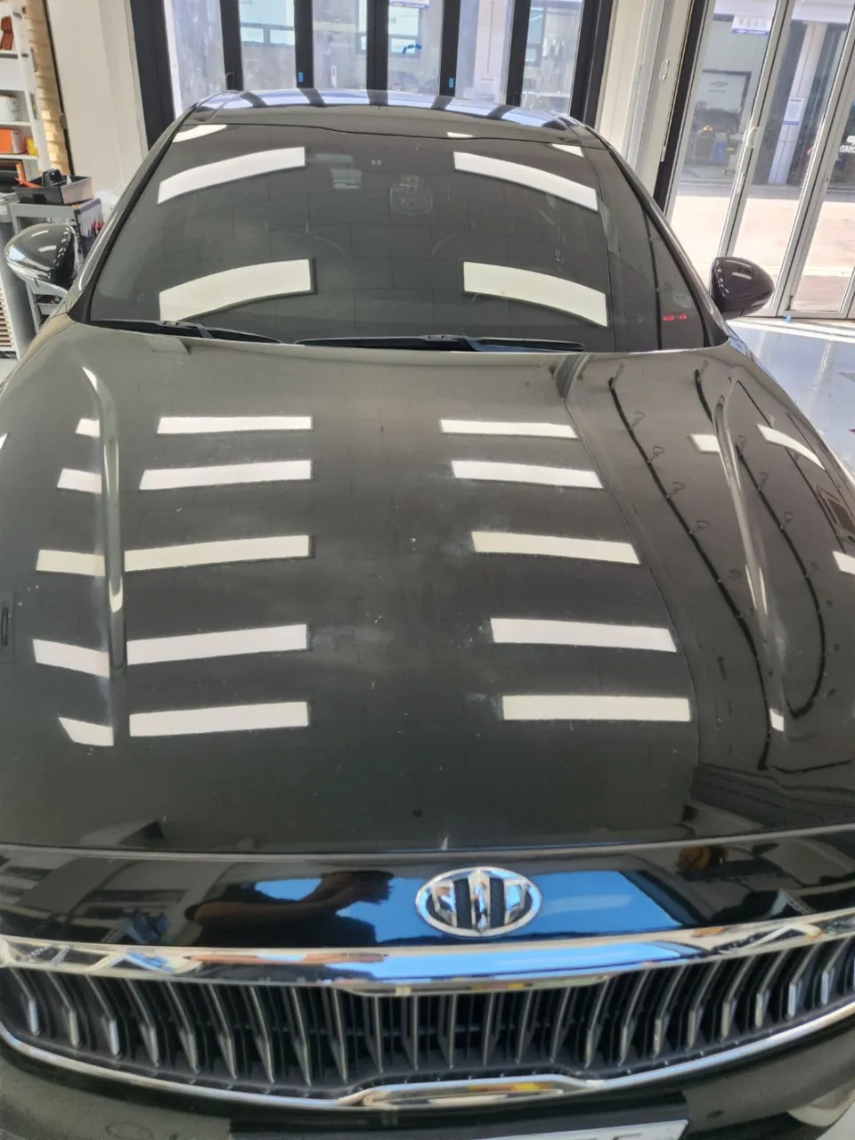 Kia K7のカーフィルム施工事例｜熱線気泡の再施工 写真
