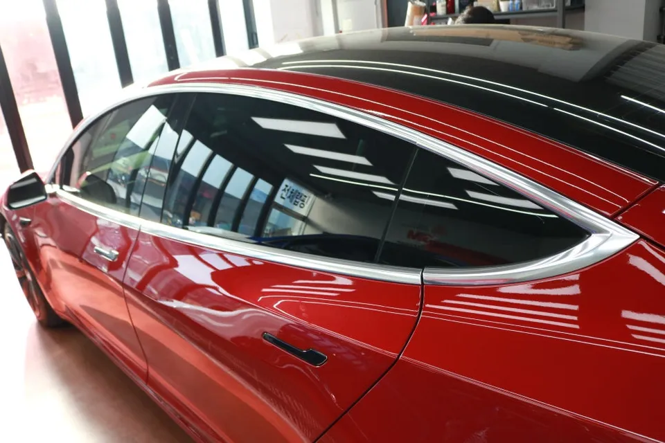 Tesla Model 3 vinyl wrap - Tesla Model 3 Chrome Delete Review — Sleek Black Transformation photo 3