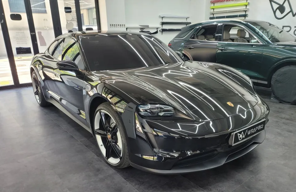 Porsche Taycan vinyl wrap - Porsche Taycan Vinyl Wrap Review: Black Gloss Transformation photo 2