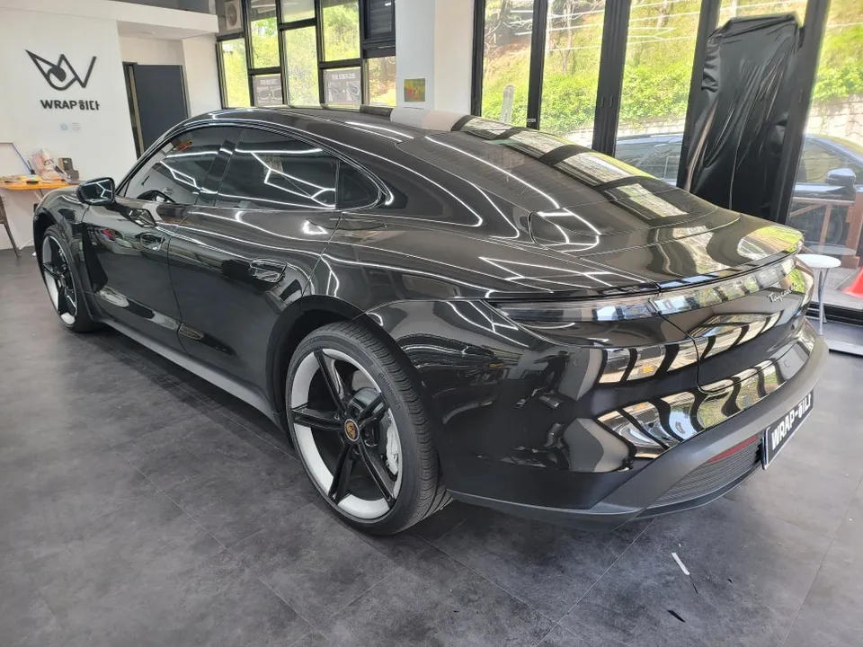 Porsche Taycan vinyl wrap - Porsche Taycan Vinyl Wrap Review: Black Gloss Transformation photo 4