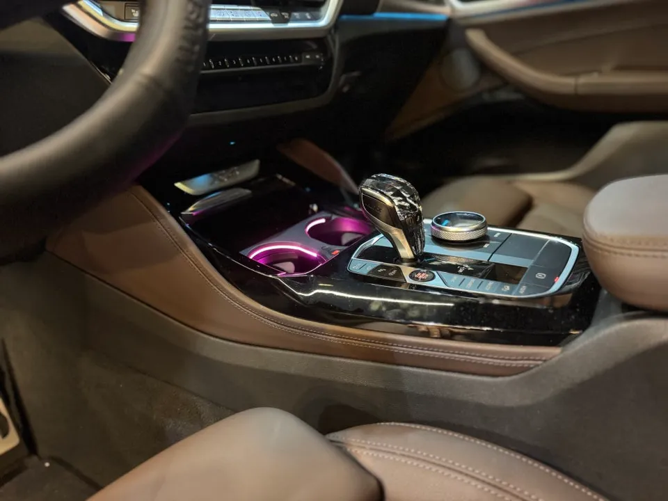 BMW X4 G02 ambient lighting - BMW X4 Ambient Lighting Upgrade: Crystal Console & Logo Lights photo 6